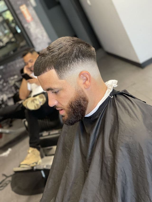 Skin fade with textured crop at Paramount Styles