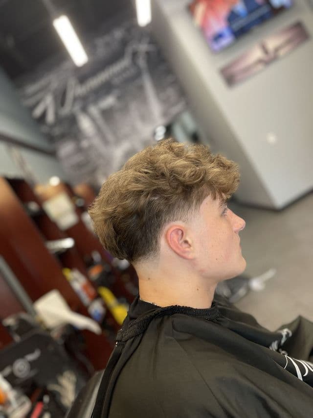 Kids haircut with side part at Paramount Styles