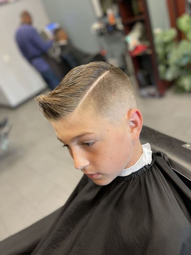 Curly fade for teen at Paramount Styles
